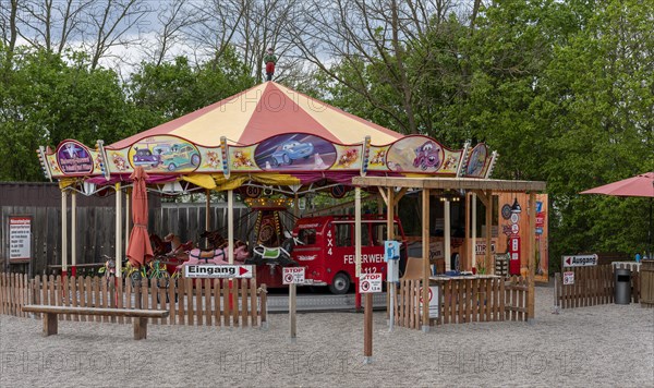 Children's carousel on the grounds of the asparagus farm in Klaistow