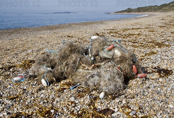 Gillnet washed up on shingle beach