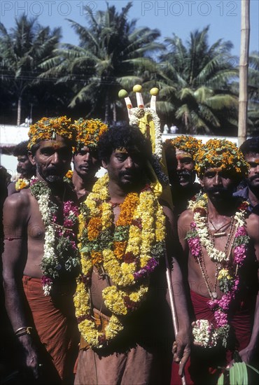 Participants of fire walking festival at Masaniamman temple in Anaimalai