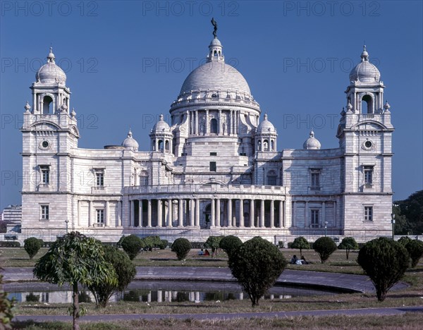 The Victoria Memorial is a large marble building in Kolkata