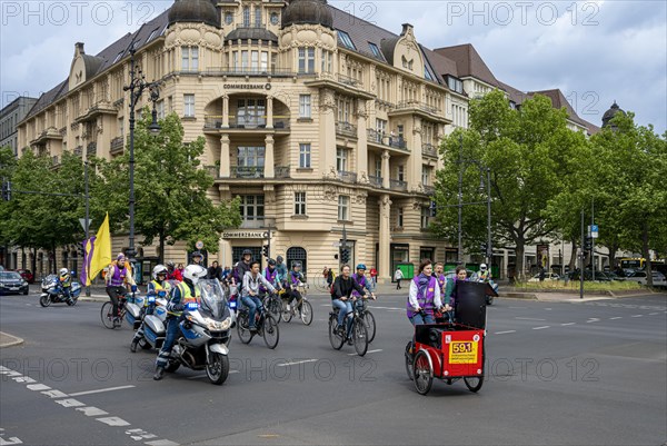 Berlin police escorting a bicycle parade on Kurfuerstendamm