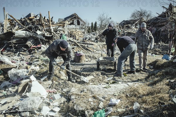 Cleaning up the ruins of the Bohunia residential neighbourhood