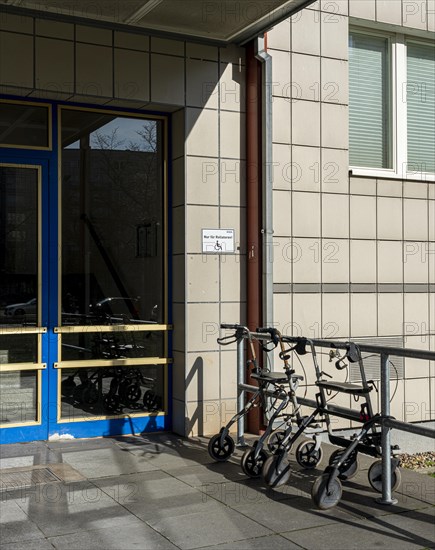 Rollator in front of the entrance to an apartment building in Berlin Mitte