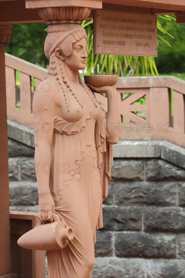 Woman figure with amphora at the Elisabethenbrunnen in the spa garden