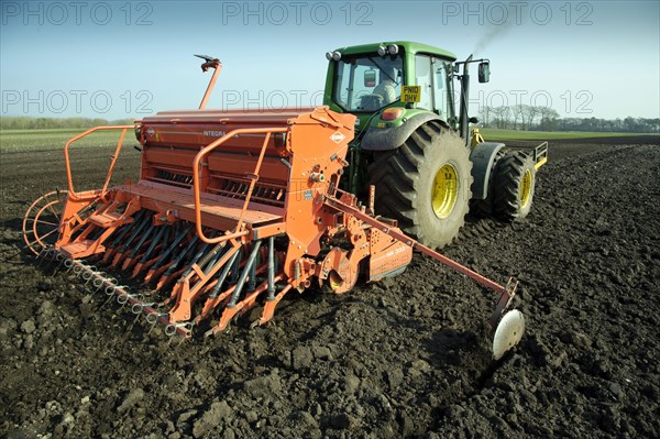 Tractor with seeder