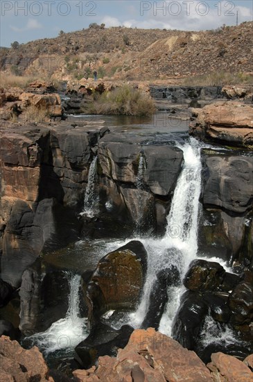 View of river and waterfall with plunge pool