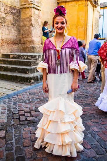 Woman in flamenco robes at the folk festival