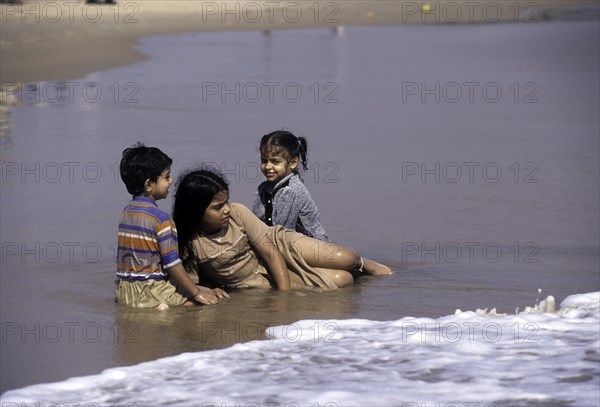 Children playing in Rishikonda beach in Visakhapatnam