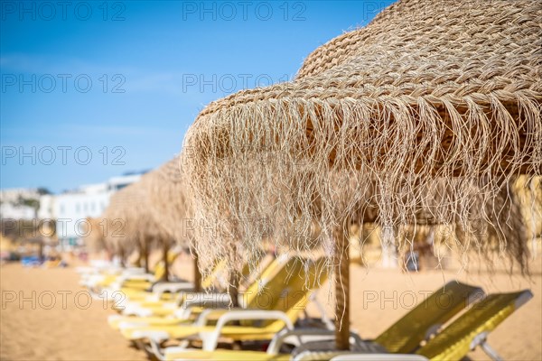 Straw umbrellas on the beach