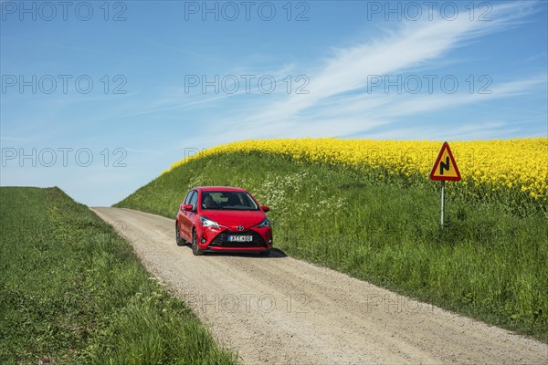 Car on a country road at Snarestad