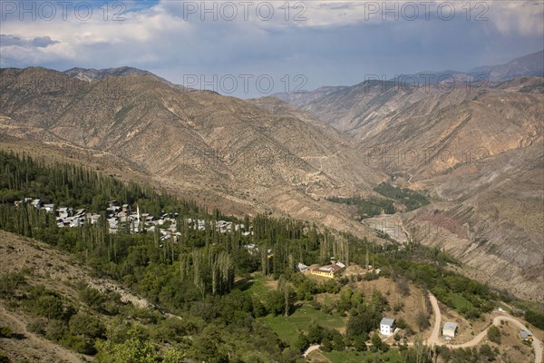 View of river valley and village