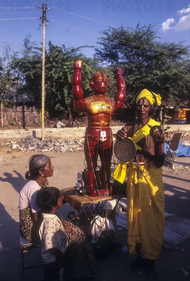 A Villager let to the use of Robot in Karamadai chariot festival near Coimbatore