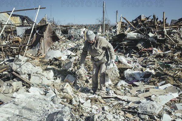 Cleaning up the ruins of the Bohunia residential district