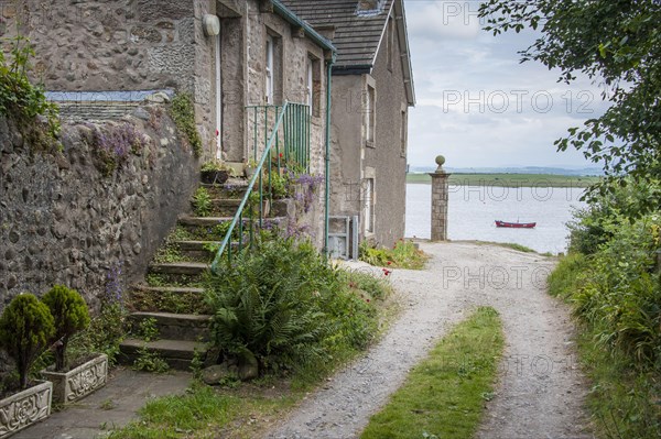 Houses in coastal village and river