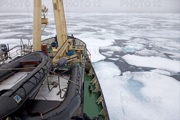 Icebreaker with Zodiac inflatable boats with rigid hull on deck