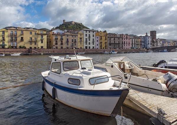 Boats on Temo River and Castle of Serravalle