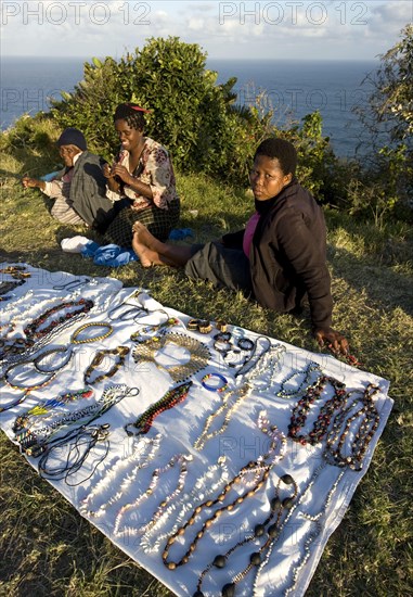 Local woman selling jewellery for tourists