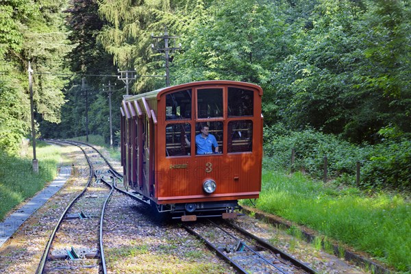 Car of the upper mountain railway with guide