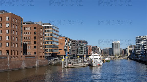 Sandtorhafen with the traditional ship harbour at Sandtorkai