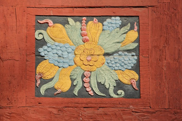 Floral wood carving with grapes and pods at the historic Amthof in Bad Camberg