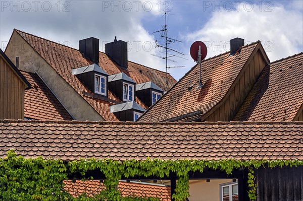 Tiled roofs with dormers on the town wall