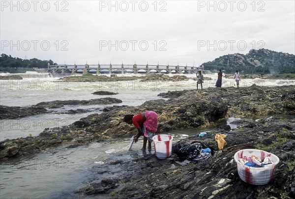 A woman washing the clothes