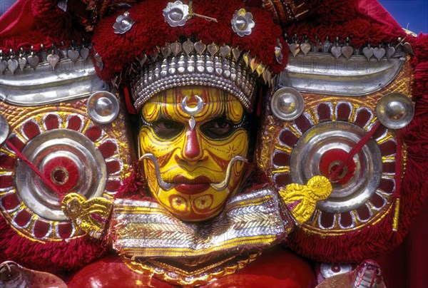 Theyyam dancer in Kavadiyattam in Athachamayam celebration in Thripunithura during Onam near Ernakulam