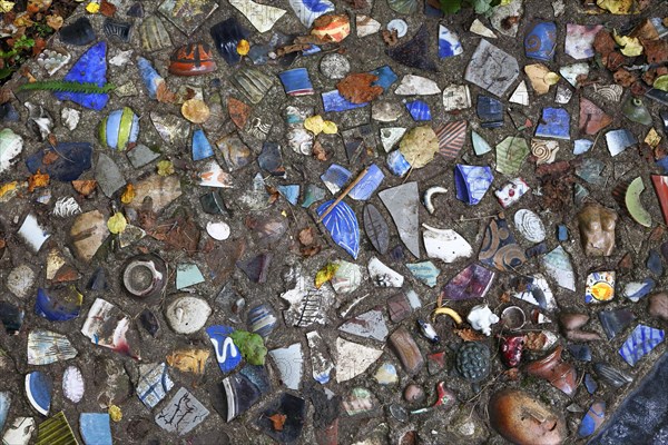 Walkway paved with broken pottery