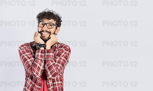 Handsome man in glasses smiling kindly