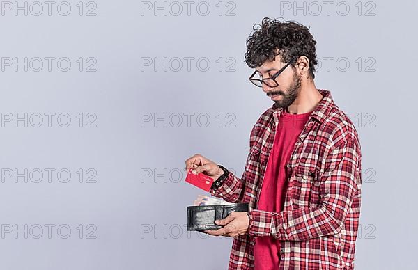 Person taking out credit card from his wallet