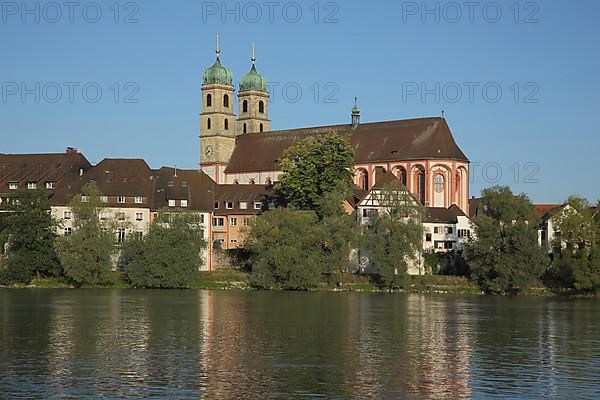 View across the Rhine to the baroque landmark Fridolinsmuenster in Bad Saeckingen