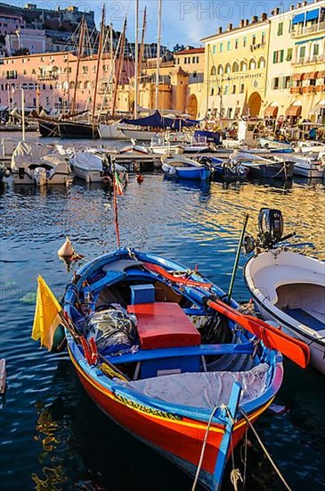 Small colourful rowing boat for fishing