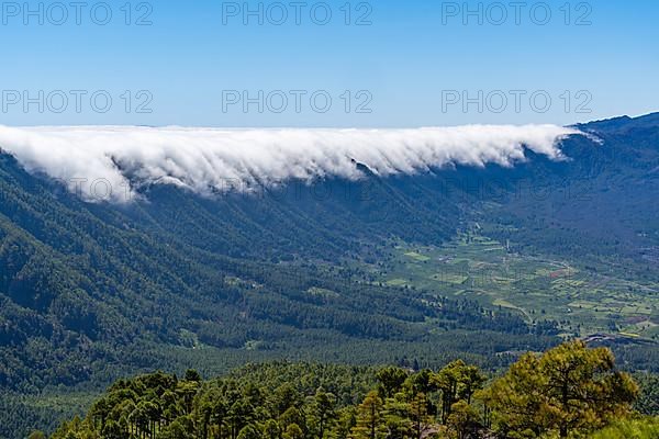 Trade wind clouds streaming over the mountains of Cumbre Nueva