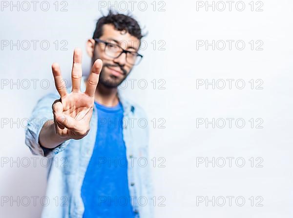 Portrait of people counting number three on isolated background. Person hand counting number three. Handsome guy hand showing number three