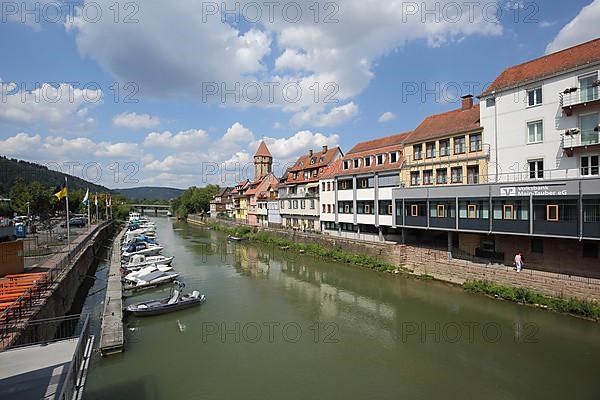 Tauber riverbank with landing stage for boats