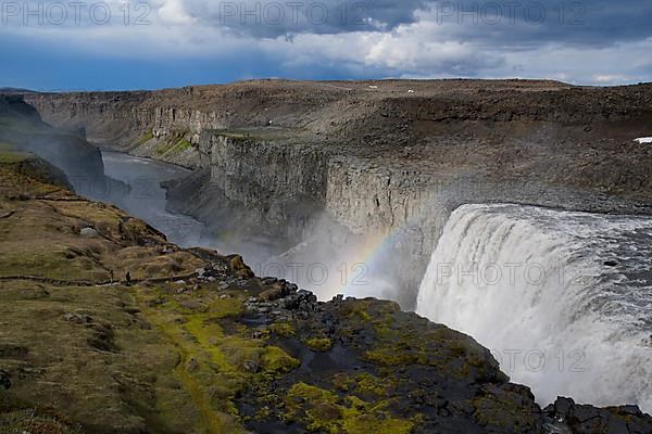 Dettifoss Waterfall with Rainbow in North-East Iceland