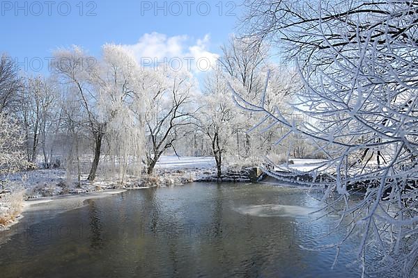 Winter landscape on the Jagst with hoarfrost and snow
