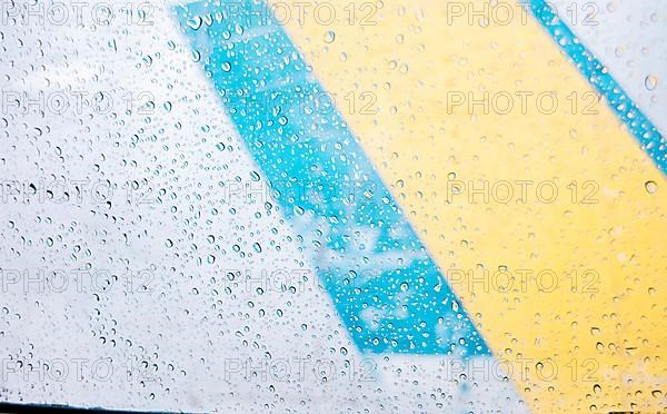 Water drops on the window on glass background