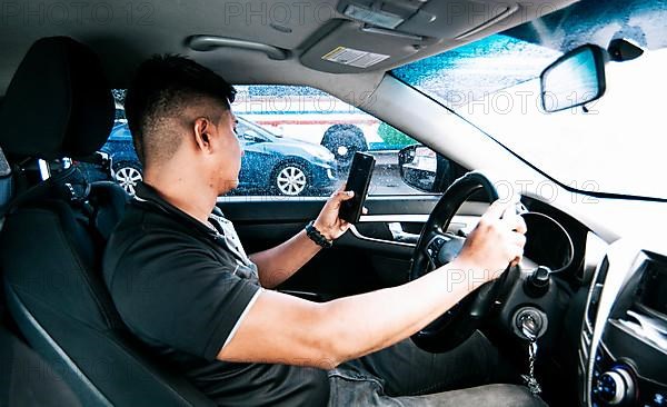 Distracted driver using the cell phone while driving