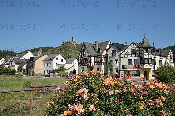 View of half-timbered houses with lower castle in Kobern-Gondorf