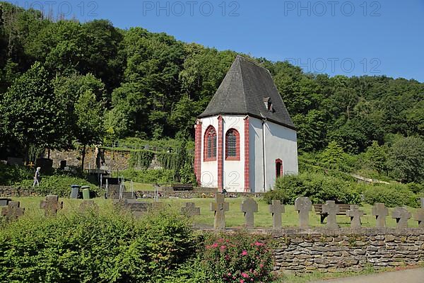 Gothic cemetery chapel Dreikoenigskapelle at the cemetery with graves in Gondorf