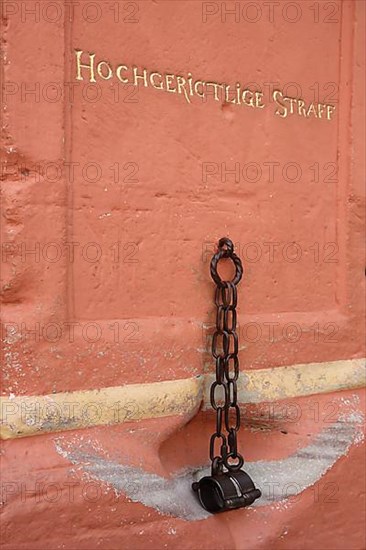 Pillory at the historic town hall with inscription Hochgerichtliche Straff in Bernkastel-Kues