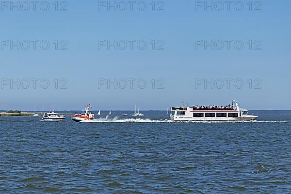 Excursion boat and other boats