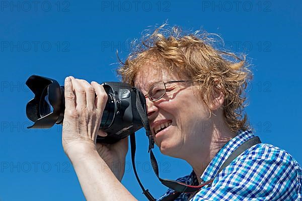 Woman taking photos