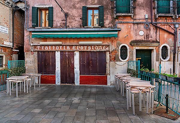 Venetian house facades in the lagoon city of Venice