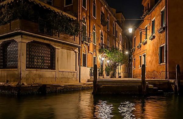 Venetian house facades at night