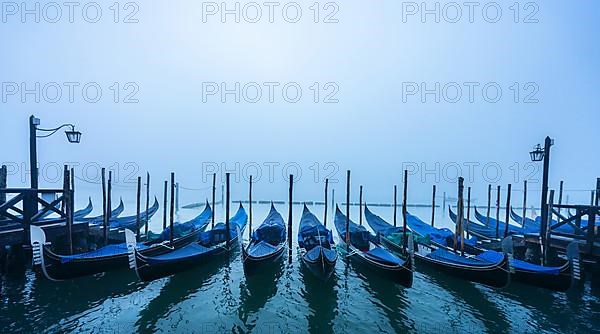 Gondola harbour in the morning mist at St Mark's Square