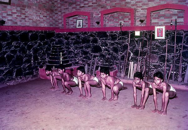 A students training in Kalari or Kalaripayattu training centre in Thiruvananthapuram