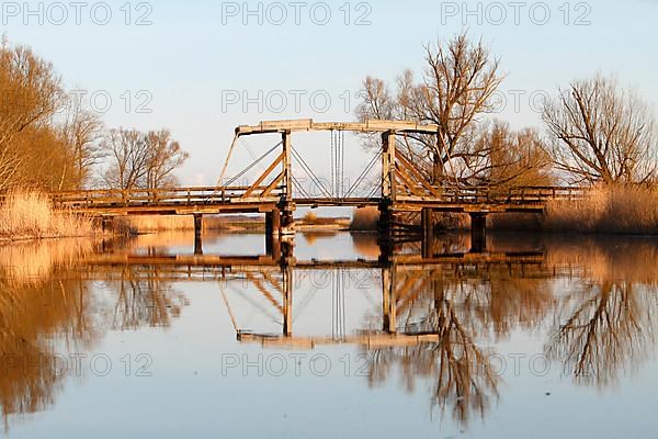 Replica of the historic wooden drawbridge over the Trebel River near Nehringen