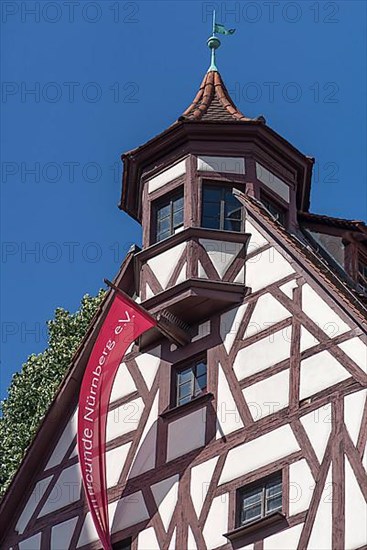 End tower of the Pilatus House with flag of the Nuremberg Old Town Friends